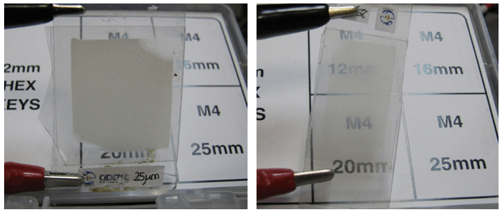 Photograph of PDLC 25-A sample at translucent off (left) and transparent on (right) optical states