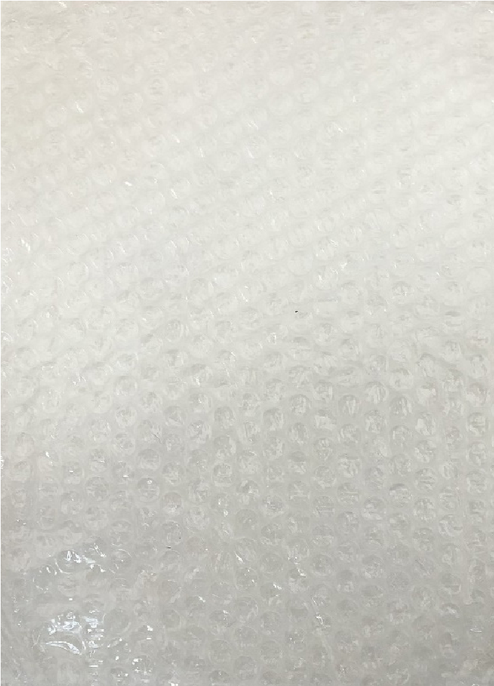 Figura 3. Texturas (Pablo Aguirre) a Jessica. Vista del reverso de la hoja (esferas de pl&aacute;stico). Cortes&iacute;a del artista.